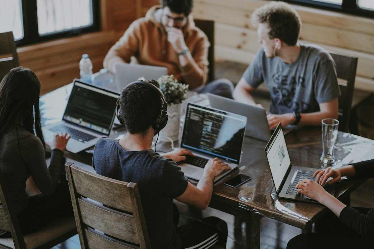 Team collaborating around a table in a modern office